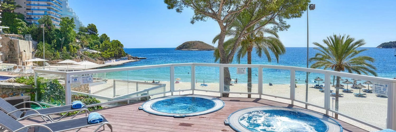 Bastões a na ilha em Magaluf - Chegue de Ferry, fique no conforto