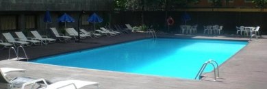 Experience Madrid: Rooftop Pool Stay on the Iconic Castellana Avenue