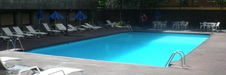 Experience Madrid: Rooftop Pool Stay on the Iconic Castellana Avenue
