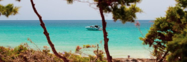 Experience Formentera: All-Inclusive Bliss with Ferry & Special Family Rates!