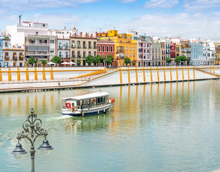 A Dreamy Seville! Your Apartment with Spa Access and a Cruise on the Guadalquivir River